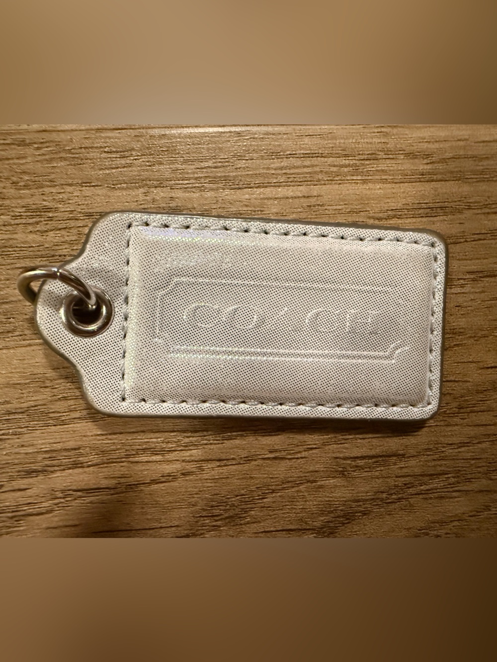 Embossed Light Beige Leather hangtag